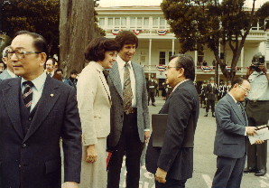 Mayor Feinstein and husband Richard Blum speak with Senator Inouye at opening