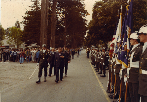 Senators Inouye and Matsunaga reviewing the troops at opening